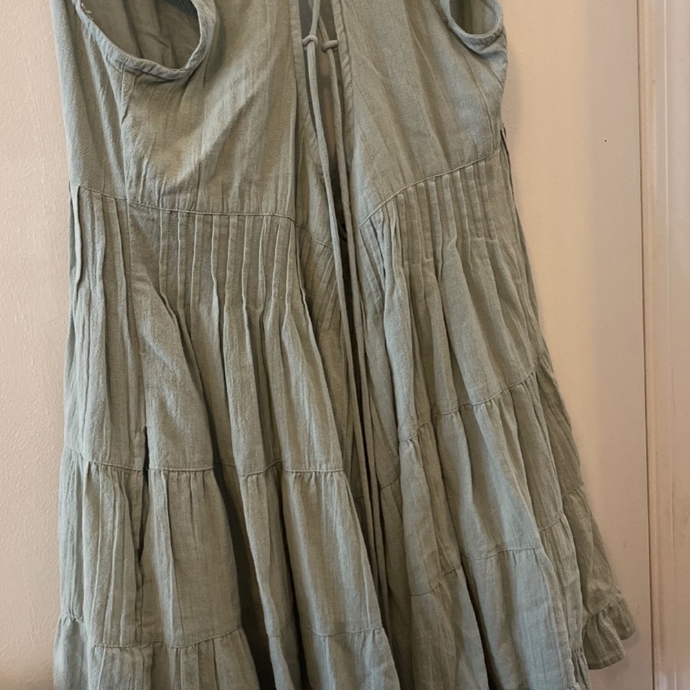 Green romper from Urban Outfitters. New never used. Super cute.